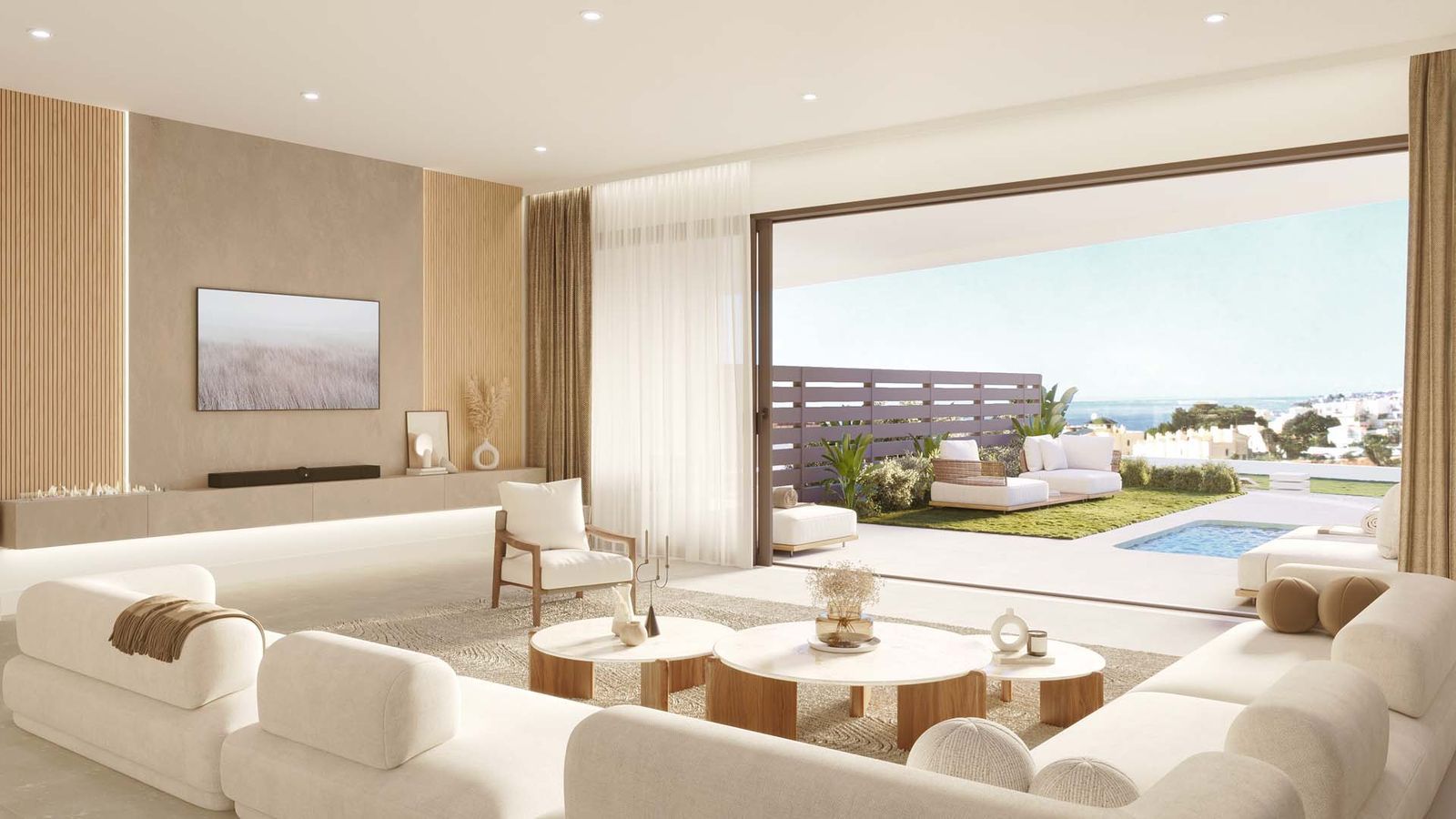 Luxe woonkamer met uitzicht op zwembad en zee bij Korall Residences.